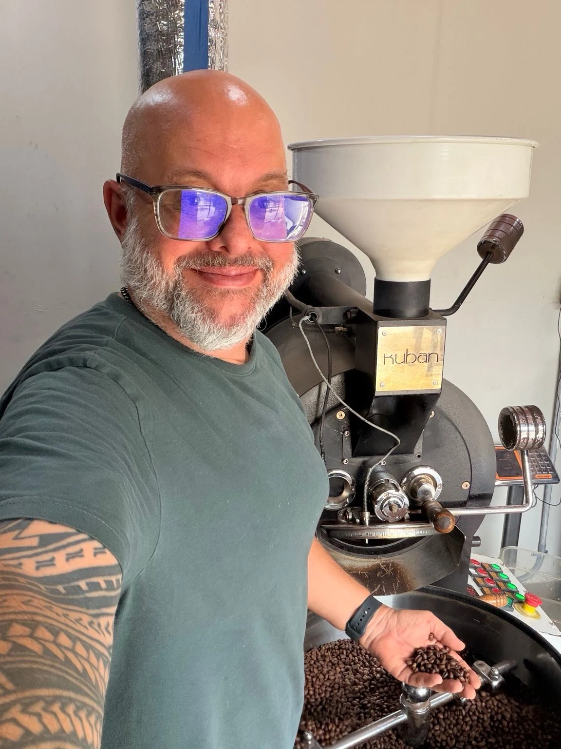 Olaf Wehrend beside Nordico's roaster in the new Nordico roastery in Costa Rica