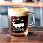 A nitrogen cold brew coffee on a bar counter in a Nordico cup